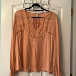 Women’s feminine blouse size Large but fits like a Medium